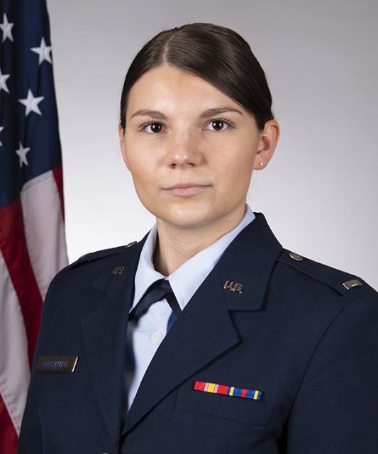 Formal photo of JAG Officer Kelly Brickman