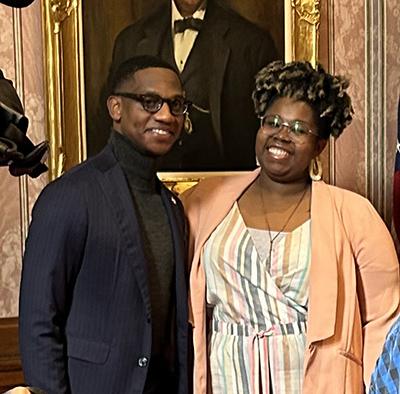 Taneisha Fair posing with Mayor Bibb