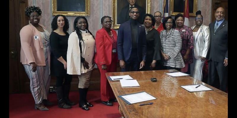 photo of the Cleveland Commission on Black Women and Girls with Mayor Bibb